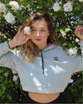 Model wearing a Reversible Women's Hoodie in Pink and Grey by the brand ALLREVERSIBLE